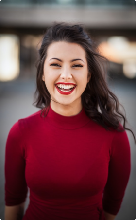 Woman in dark red sweater smiling